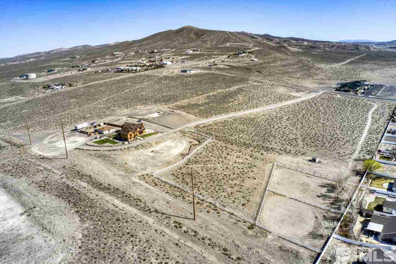 650 Desert Shadows Lane Fernley, NV 89408 - Photo 36 of 39 an aerial view of residential houses with outdoor space