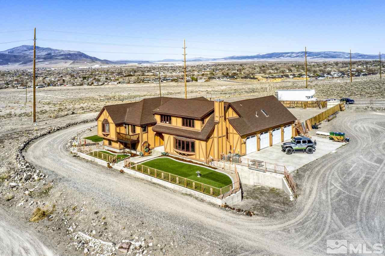 650 Desert Shadows Lane Fernley, NV 89408 - Photo 38 of 39 a view of a city with lawn chairs