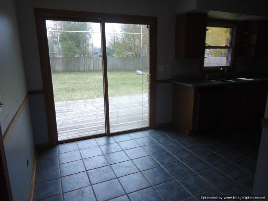 11135 East Fisher Road Rochelle, IL 61068 - Photo 5 of 11 a view of an empty room and window