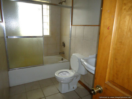 11135 East Fisher Road Rochelle, IL 61068 - Photo 8 of 11 a bathroom with a toilet and a shower