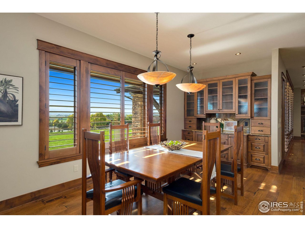 39759 Pinnacle Ridge Court Severance, CO 80610 - Photo 16 of 40 a view of a dining room with furniture window and outside view