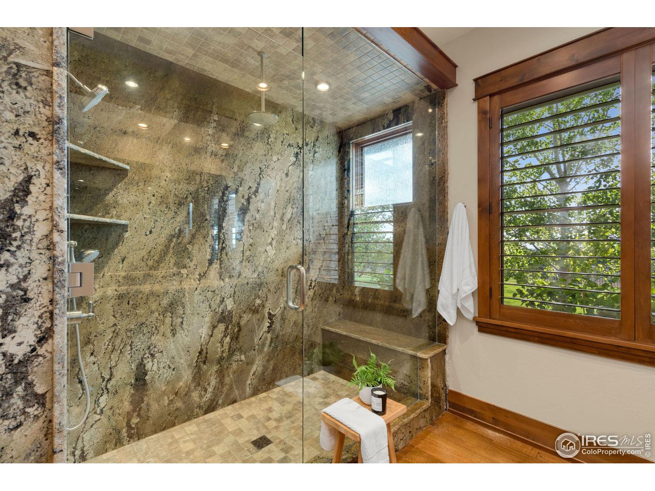 39759 Pinnacle Ridge Court Severance, CO 80610 - Photo 23 of 40 a bathroom with a shower and a sink