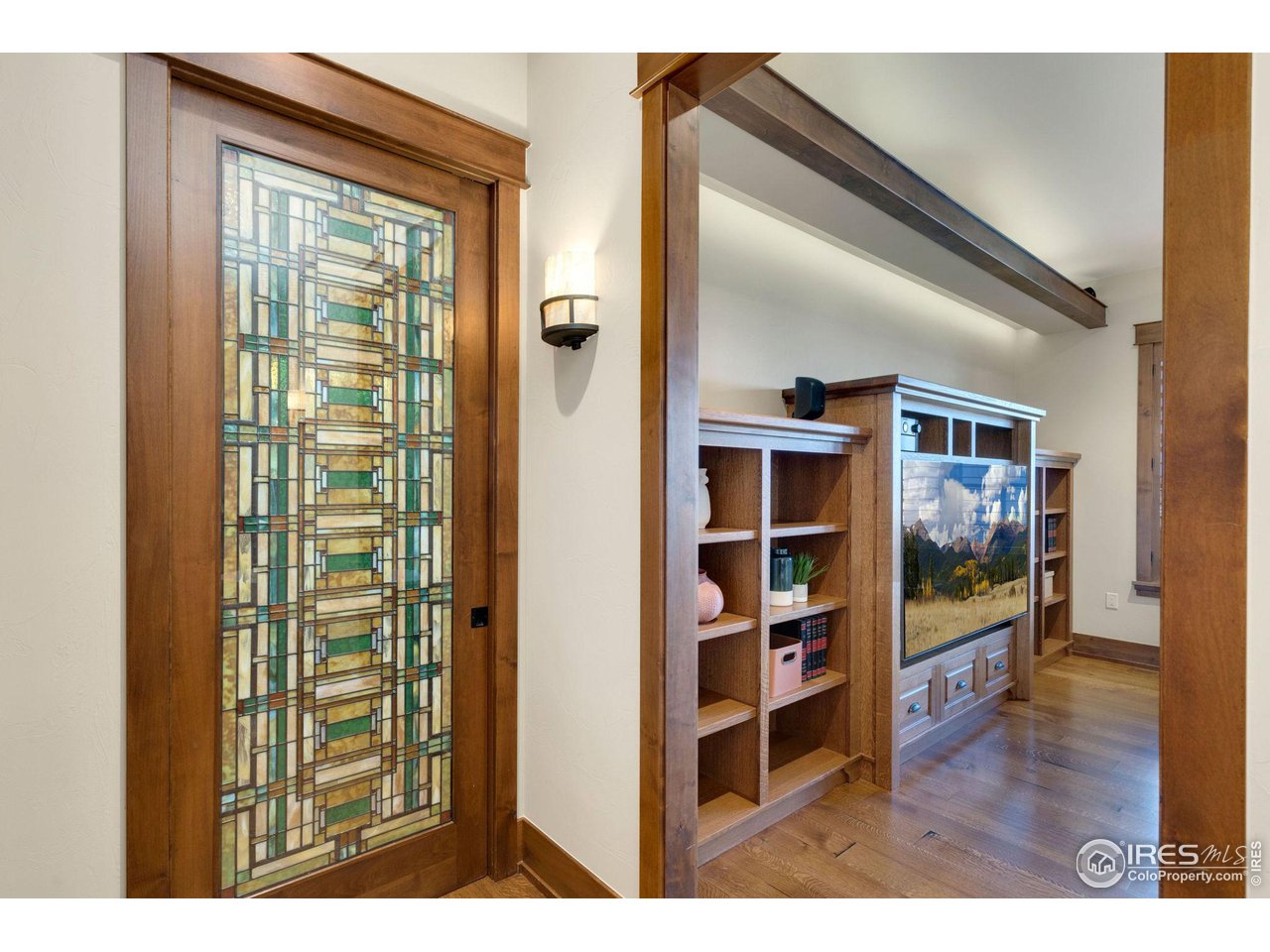 39759 Pinnacle Ridge Court Severance, CO 80610 - Photo 26 of 40 a view of living room with wooden floor and closet