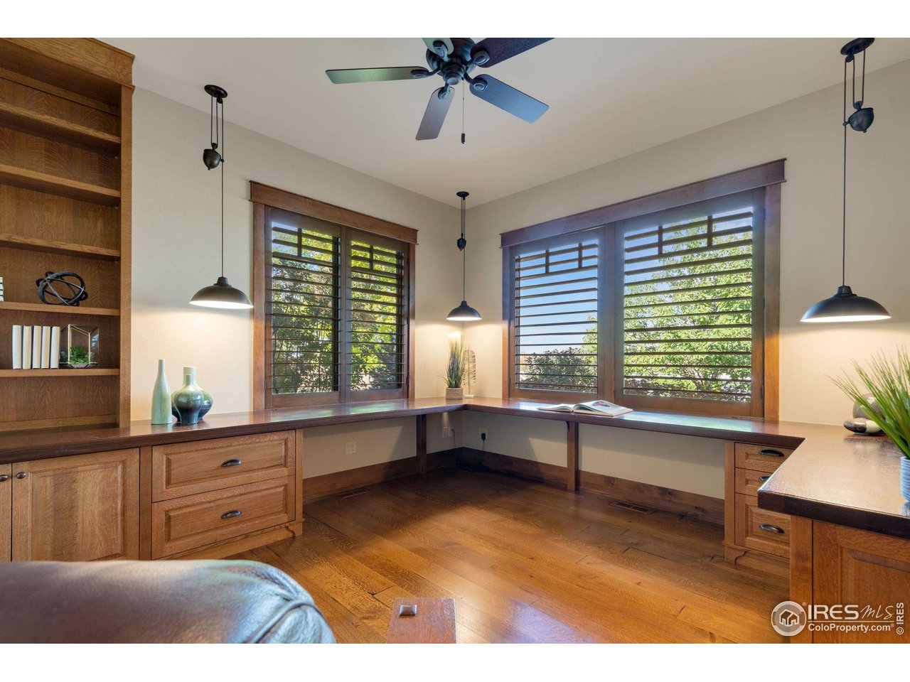 39759 Pinnacle Ridge Court Severance, CO 80610 - Photo 27 of 40 a living room with furniture and a window