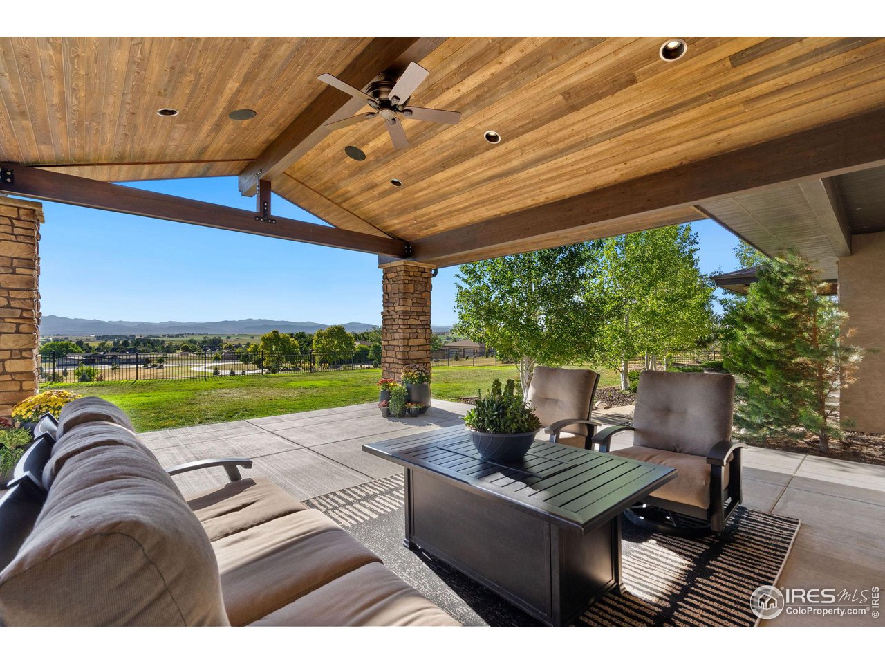 39759 Pinnacle Ridge Court Severance, CO 80610 - Photo 30 of 40 a view of swimming pool with outdoor seating and a couch