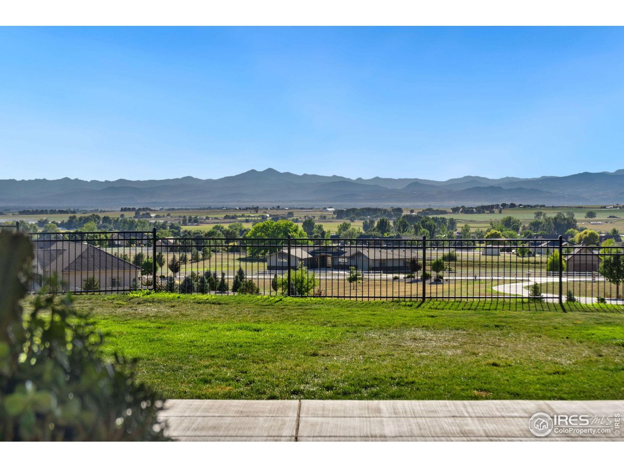 39759 Pinnacle Ridge Court Severance, CO 80610 - Photo 31 of 40 a view of a city with mountain view