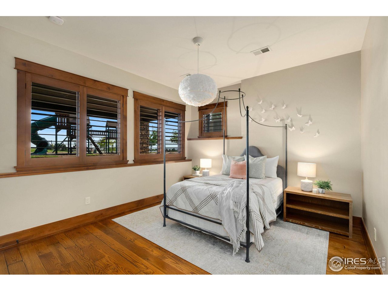 39759 Pinnacle Ridge Court Severance, CO 80610 - Photo 34 of 40 a bedroom with a bed and window