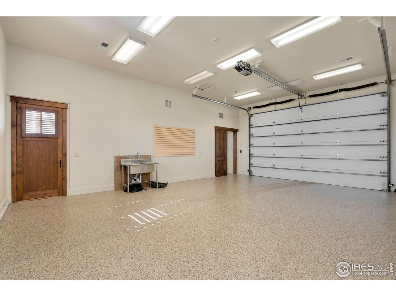 39759 Pinnacle Ridge Court Severance, CO 80610 - Photo 38 of 40 a view of a livingroom with furniture and a ceiling fan
