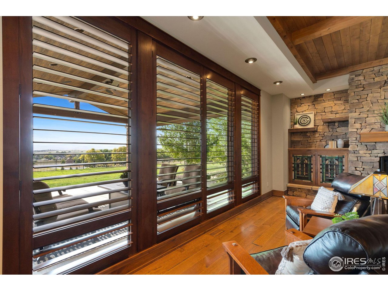 39759 Pinnacle Ridge Court Severance, CO 80610 - Photo 10 of 40 a view of living room with furniture and floor to ceiling window