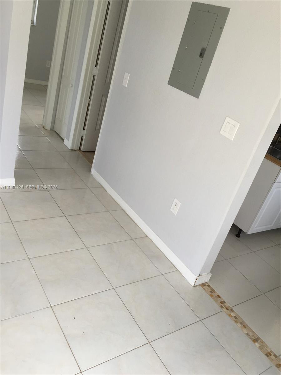 4700 Southwest 97th Avenue, Unit 4700 Miami, FL 33165 - Photo 5 of 9 a view of a room with an empty space