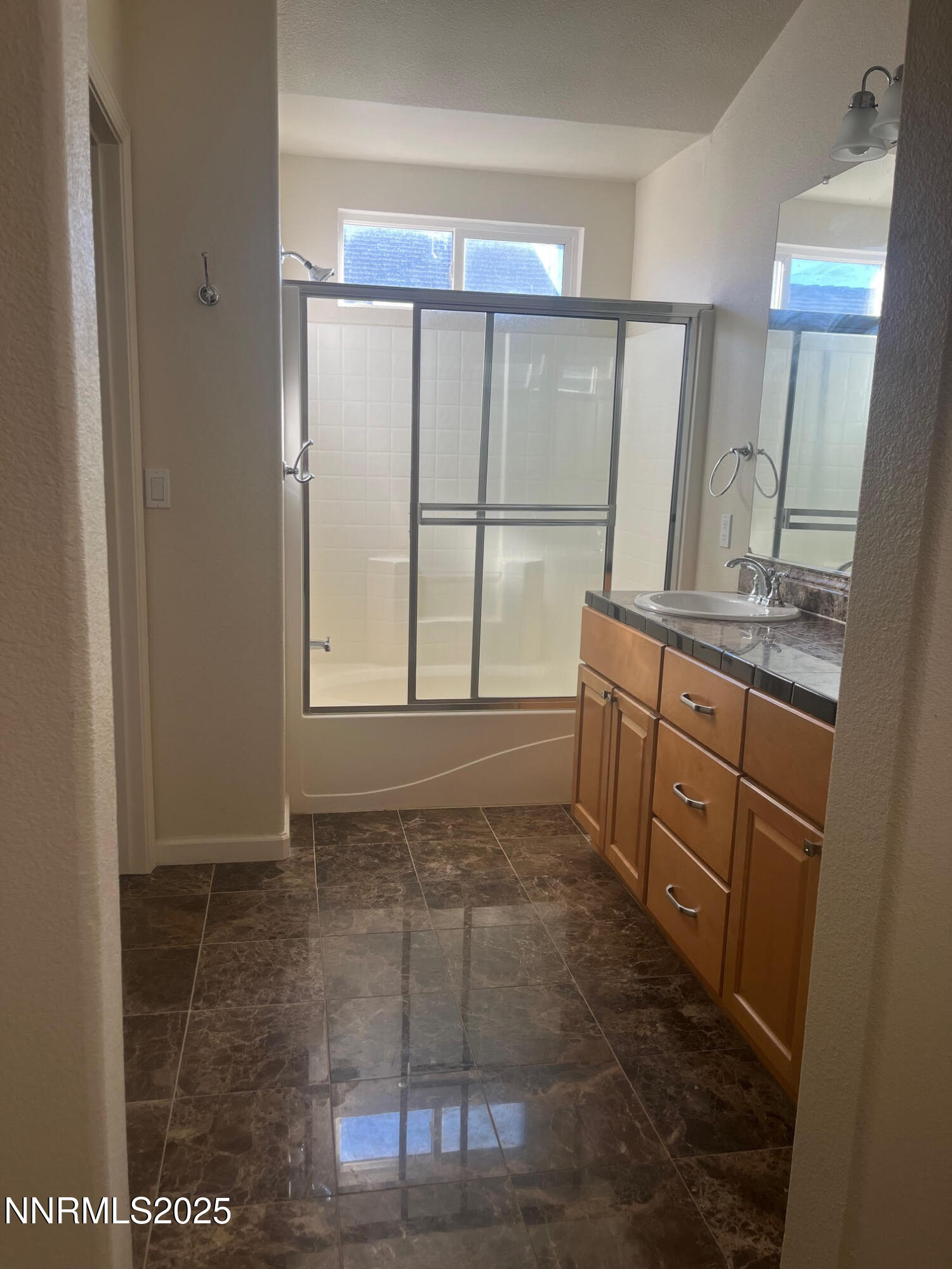 5722 Golden Eagle Drive Reno, NV 89523 - Photo 20 of 32 a room with a large window