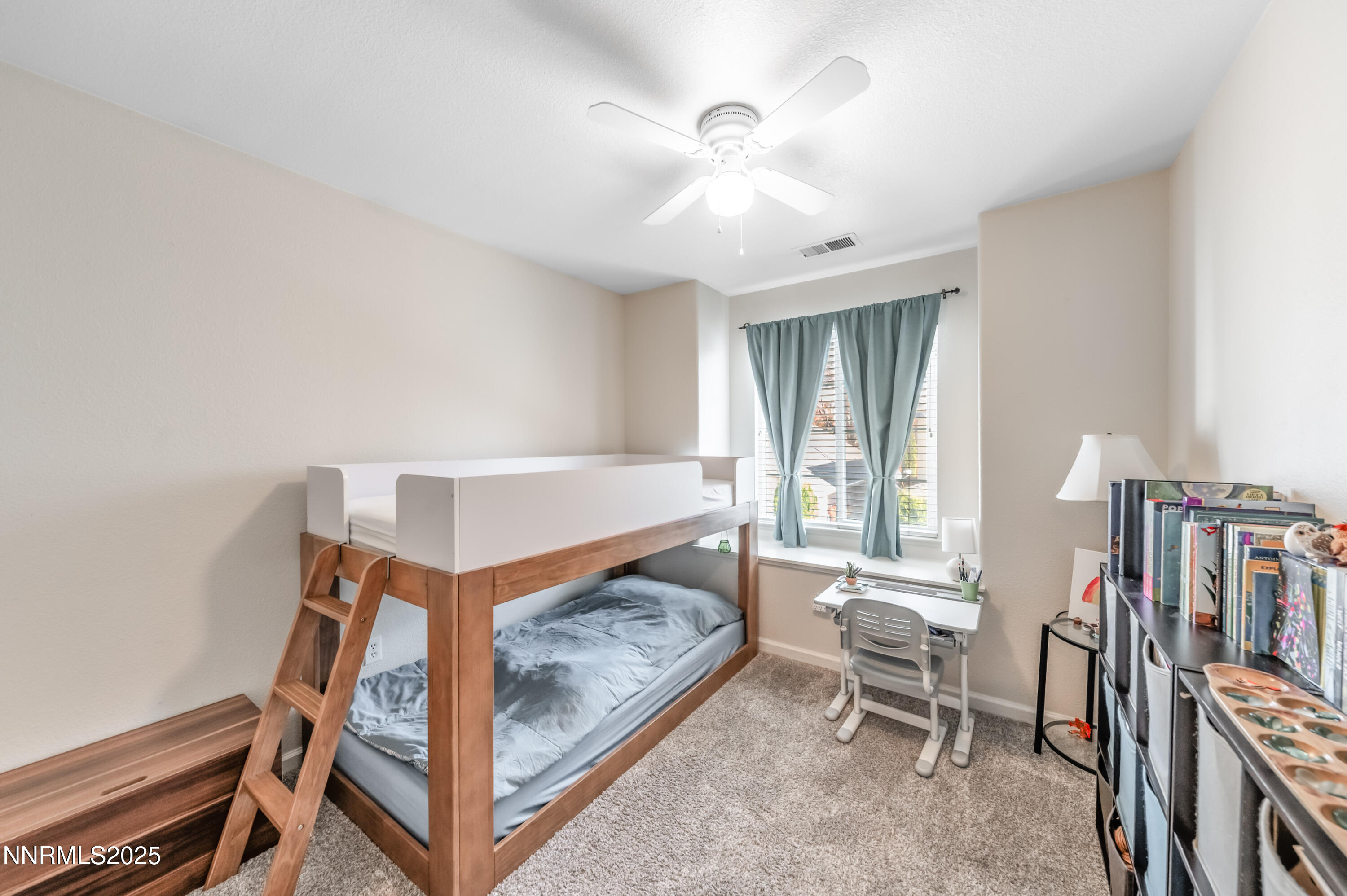 5722 Golden Eagle Drive Reno, NV 89523 - Photo 26 of 32 a bedroom with furniture and a window