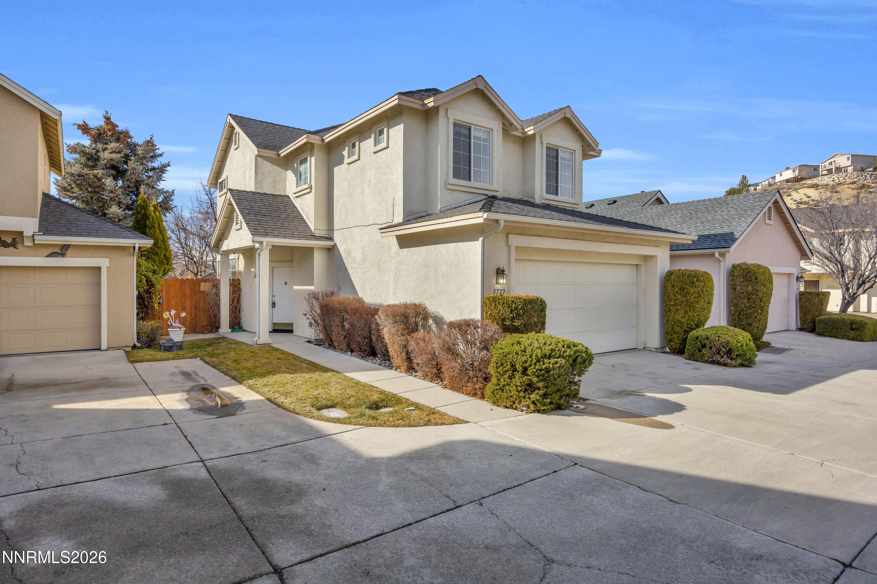 5722 Golden Eagle Drive Reno, NV 89523 - Photo 5 of 5 a front view of a house with a yard