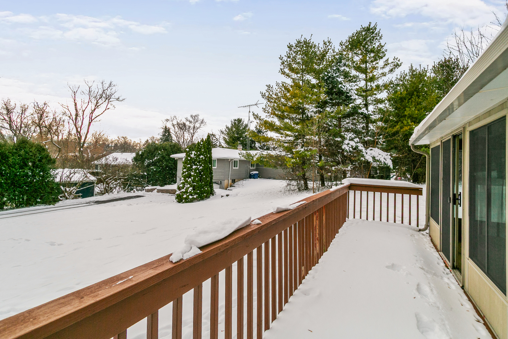 6305 Robert Road Cary, IL 60013 - Photo 2 of 24 a view of a balcony with trees