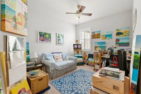 a living room with furniture and a window