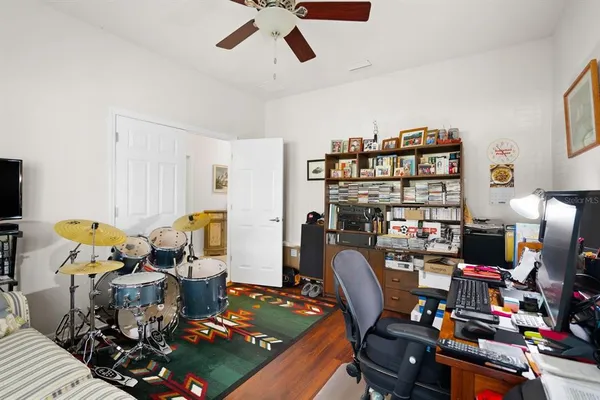 a view of a workspace with furniture and a couch