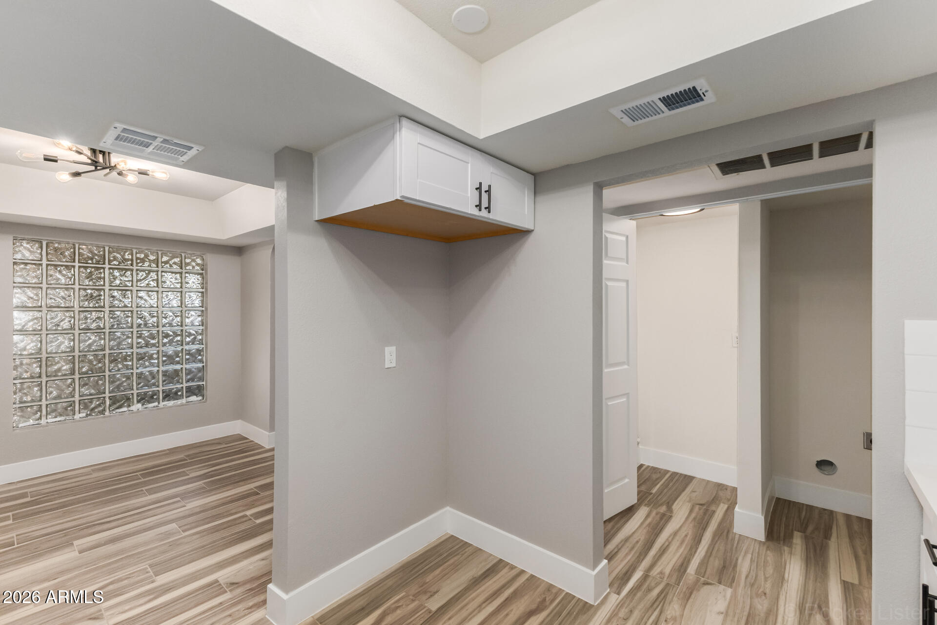 214 East Ruth Avenue, Unit 109 Phoenix, AZ 85020 - Photo 12 of 26 a view of a room that has a bed and a window in it