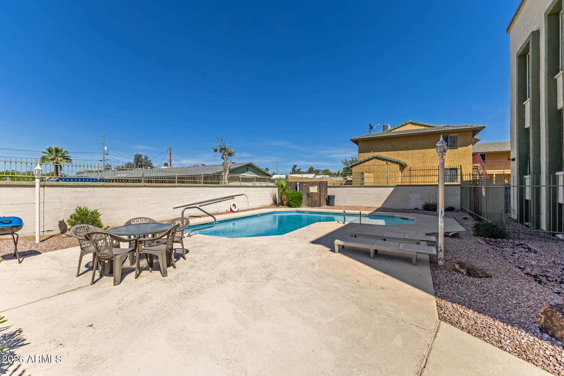 214 East Ruth Avenue, Unit 109 Phoenix, AZ 85020 - Photo 23 of 26 swimming pool view with a seating space