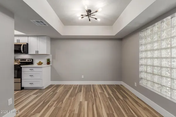 a room with a bed and a window
