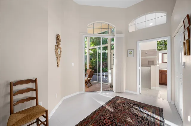 a bedroom with a bed and a table in it