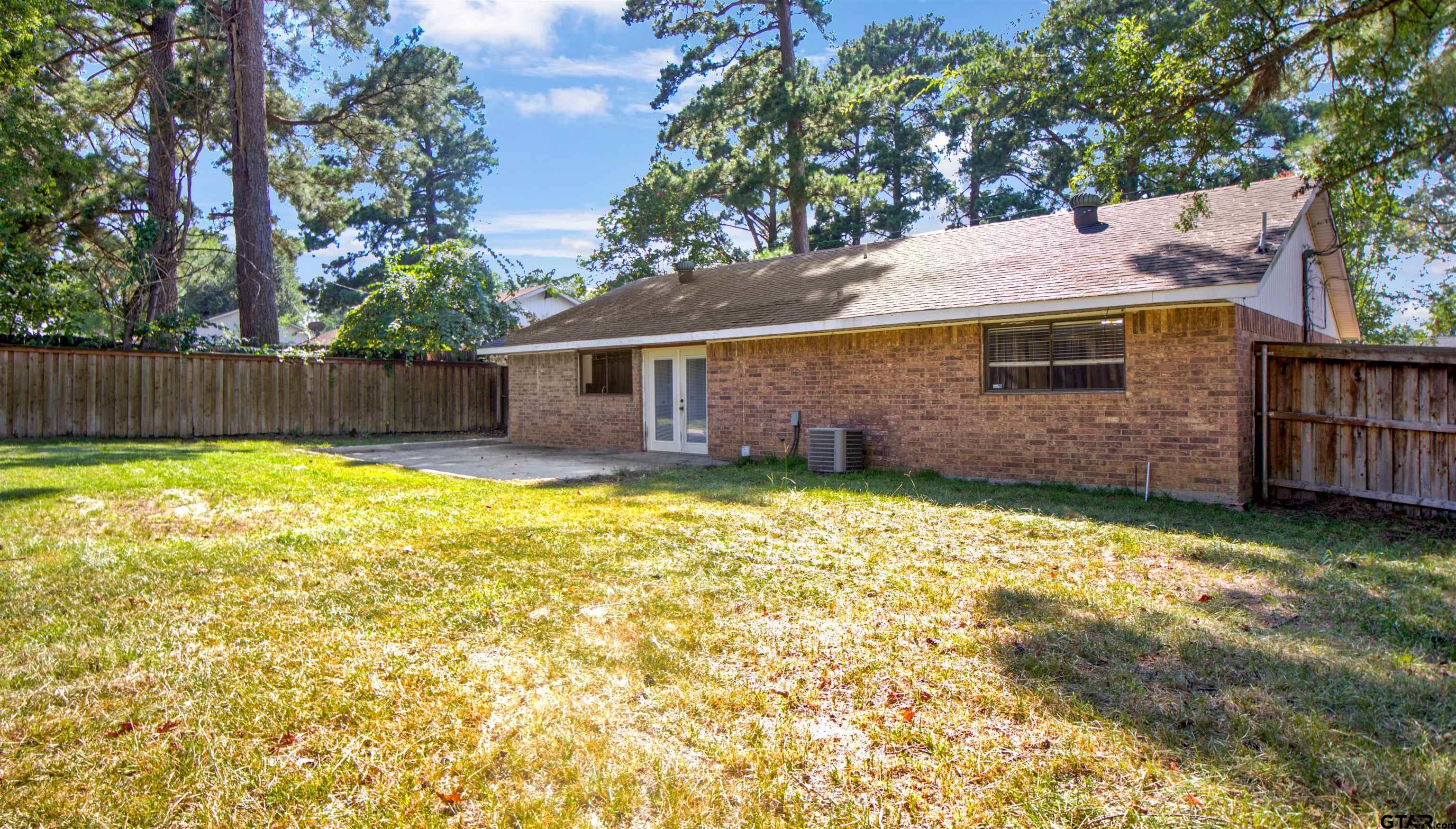 206 Walter Street Longview, TX 75603 - Photo 17 of 17 a view of a house with a yard