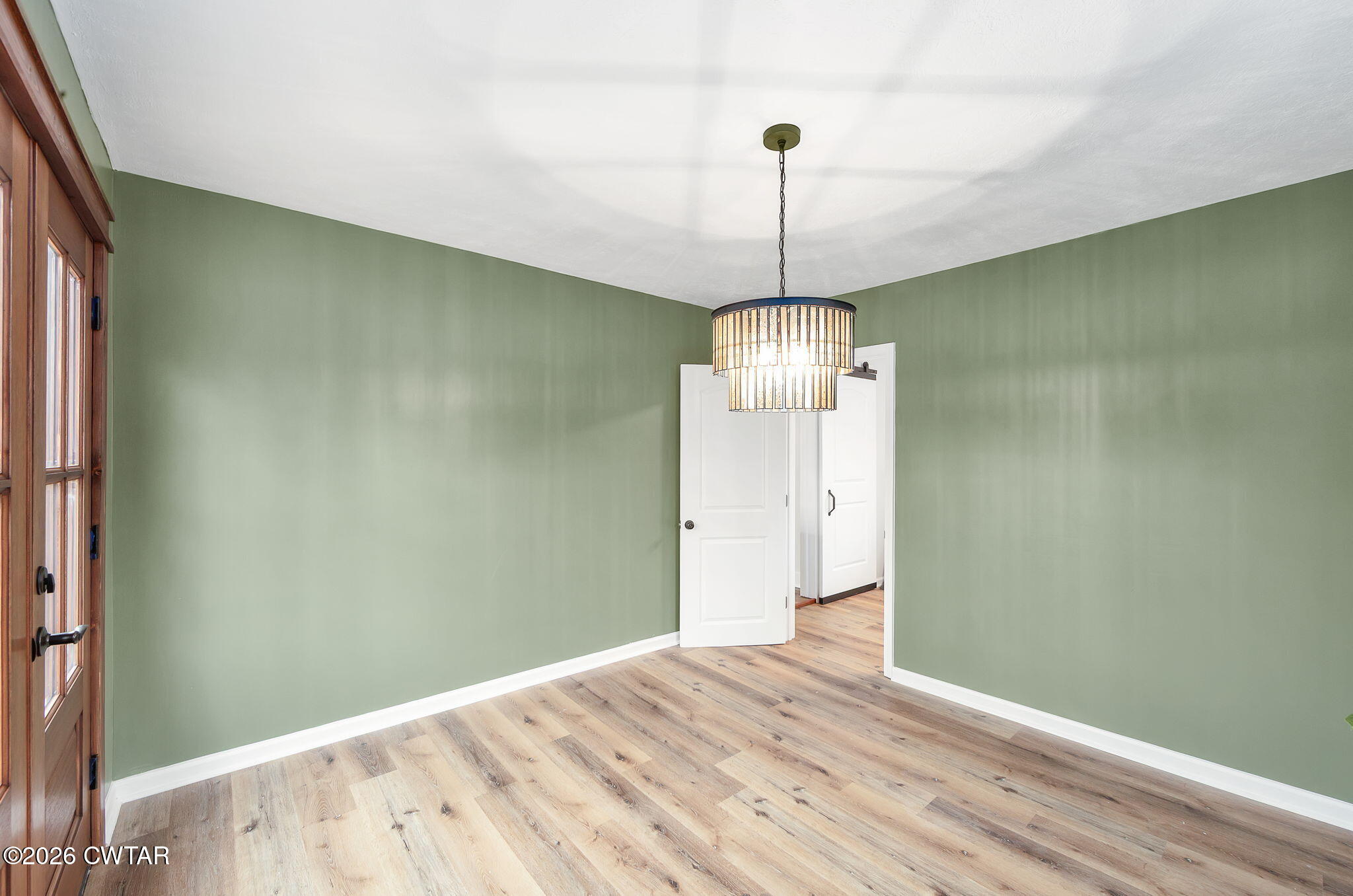 28 Mt Orange Road Trenton, TN 38382 - Photo 13 of 31 a view of empty room with wooden floor