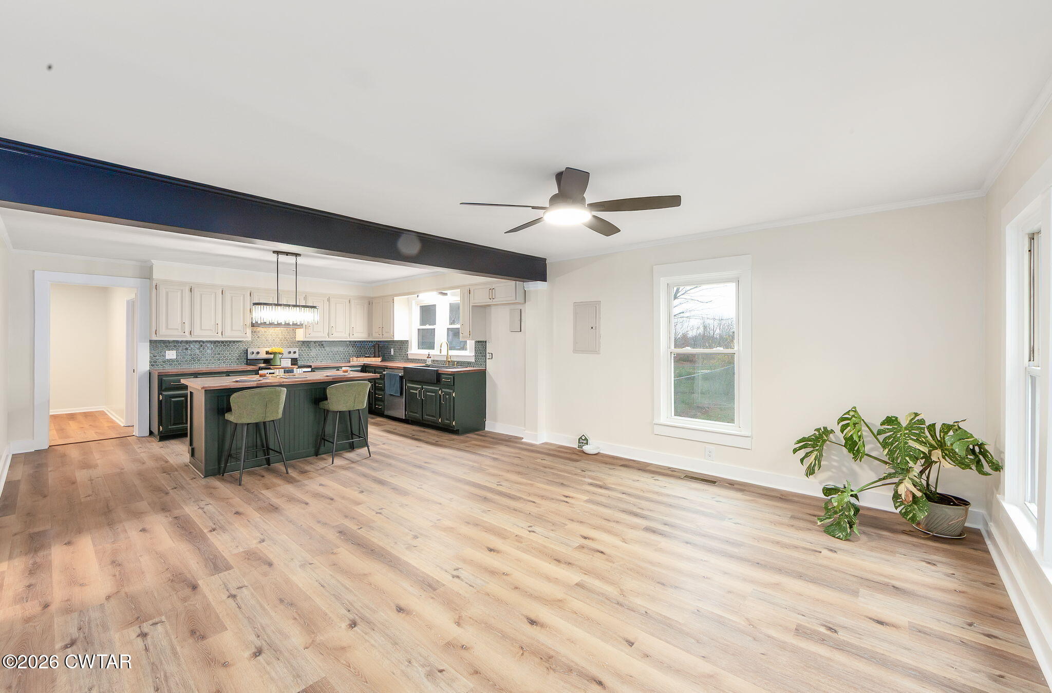 28 Mt Orange Road Trenton, TN 38382 - Photo 4 of 31 a large kitchen with stainless steel appliances granite countertop a sink a stove and a refrigerator