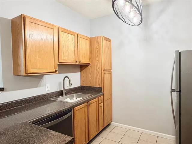 a bathroom with a sink a vanity and a mirror