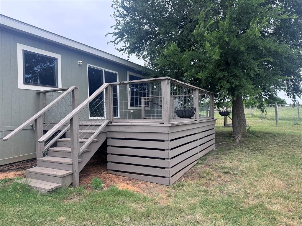 7268 Brangus Road Anna, TX 75409 - Photo 5 of 21 a view of a house with backyard and trees