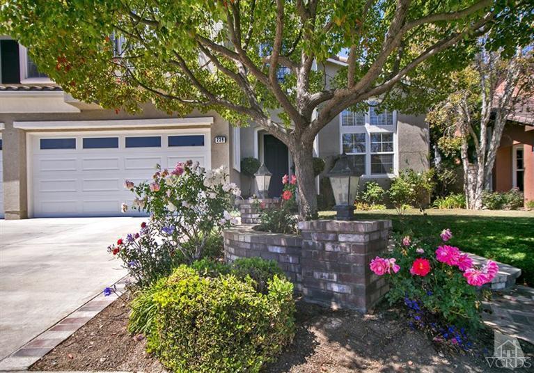 239 Knoll Ridge Road Simi Valley, CA 93065 - Photo 2 of 61 a front view of a house with a yard and fountain