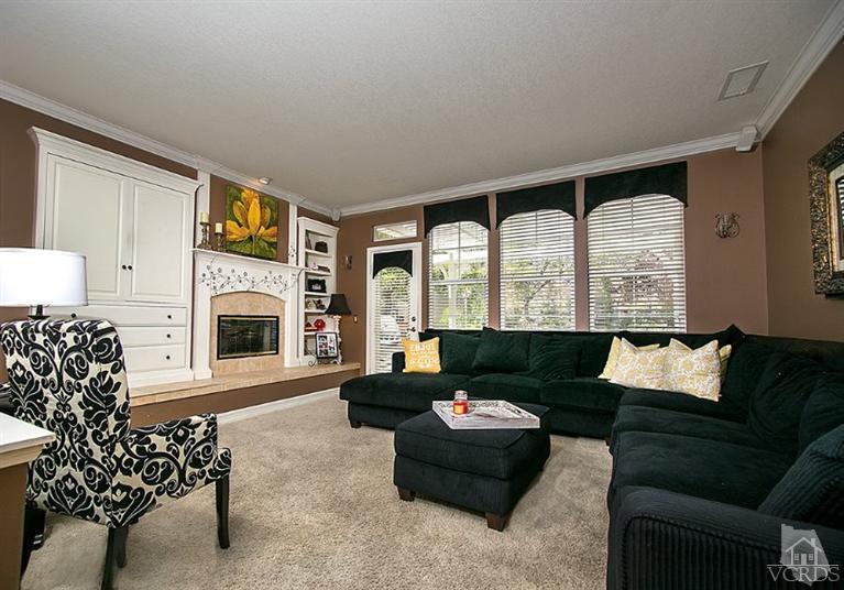 239 Knoll Ridge Road Simi Valley, CA 93065 - Photo 14 of 61 a living room with furniture large window and fireplace