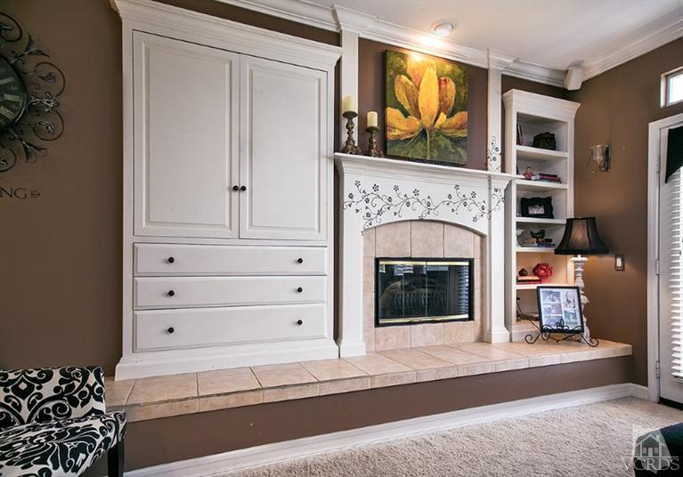 239 Knoll Ridge Road Simi Valley, CA 93065 - Photo 16 of 61 a living room with furniture and a fireplace