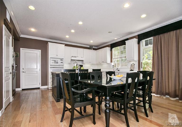 239 Knoll Ridge Road Simi Valley, CA 93065 - Photo 22 of 61 a view of a dining room with furniture and wooden floor