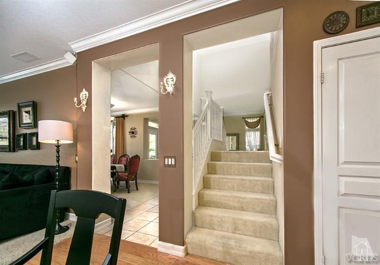 239 Knoll Ridge Road Simi Valley, CA 93065 - Photo 28 of 61 a view of a hallway with a livingroom and furniture