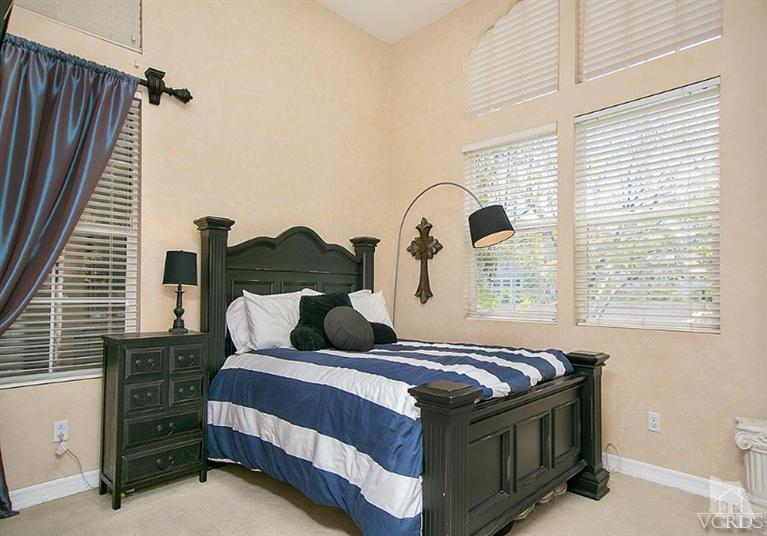 239 Knoll Ridge Road Simi Valley, CA 93065 - Photo 29 of 61 a bedroom with bed and window