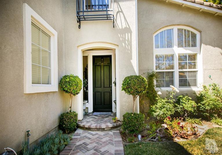 239 Knoll Ridge Road Simi Valley, CA 93065 - Photo 4 of 61 a front view of a house with garden
