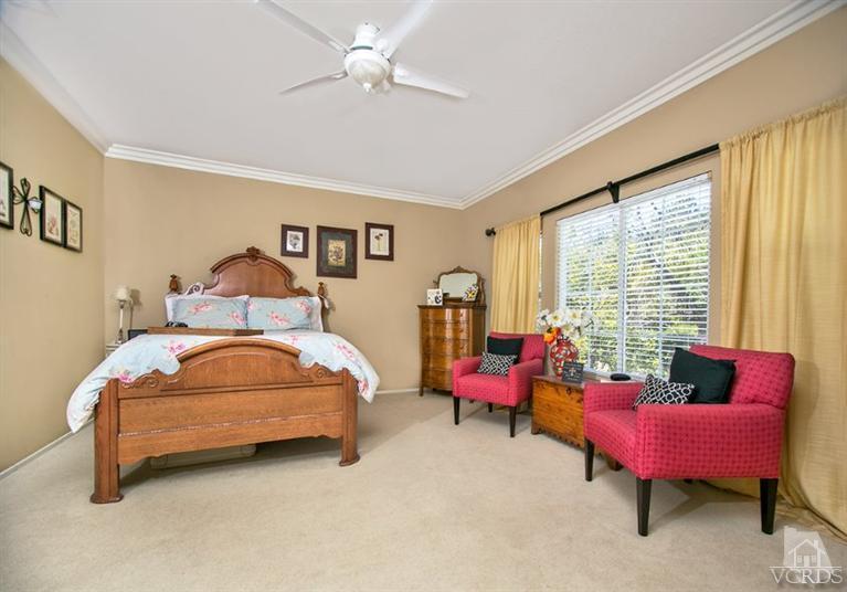 239 Knoll Ridge Road Simi Valley, CA 93065 - Photo 32 of 61 a bedroom with bed and windows