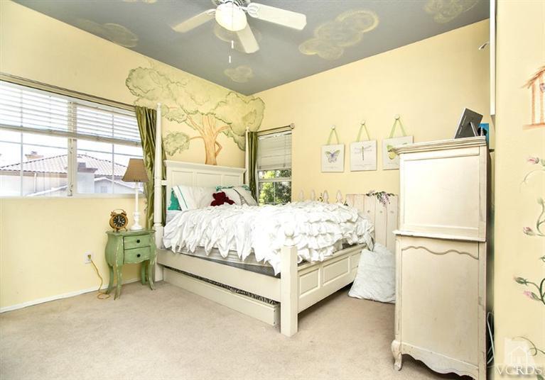 239 Knoll Ridge Road Simi Valley, CA 93065 - Photo 36 of 61 a bed sitting in a spacious bedroom next to a window