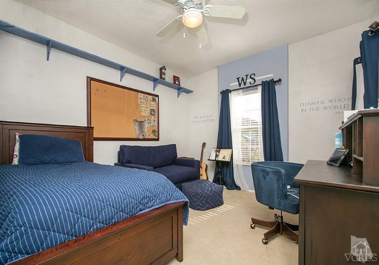 239 Knoll Ridge Road Simi Valley, CA 93065 - Photo 40 of 61 a bedroom with a bed and a desk