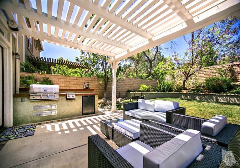 239 Knoll Ridge Road Simi Valley, CA 93065 - Photo 47 of 61 a view of an outdoor sitting area with furniture and garden view