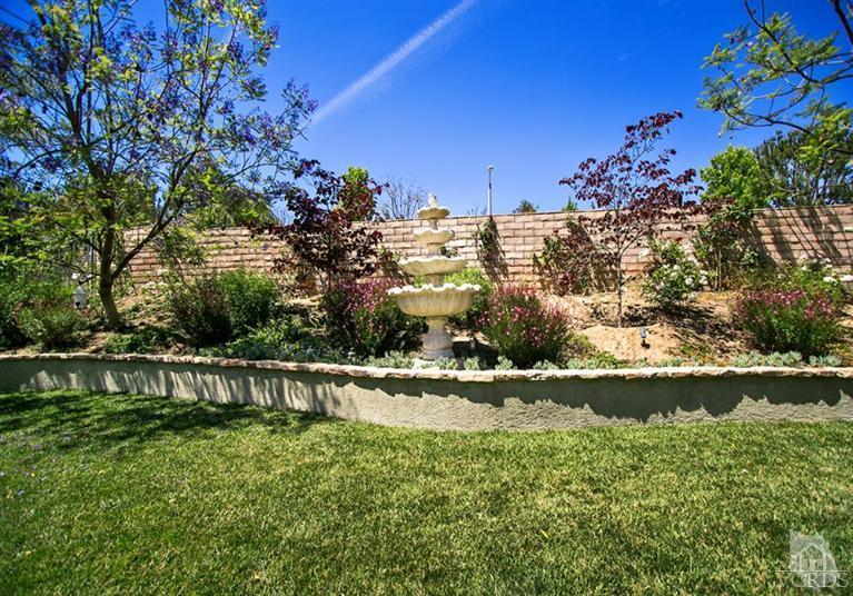 239 Knoll Ridge Road Simi Valley, CA 93065 - Photo 52 of 61 a view of a yard with a house
