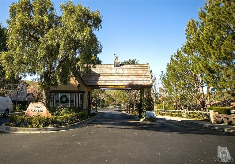 239 Knoll Ridge Road Simi Valley, CA 93065 - Photo 56 of 61 a front view of a house with a garden