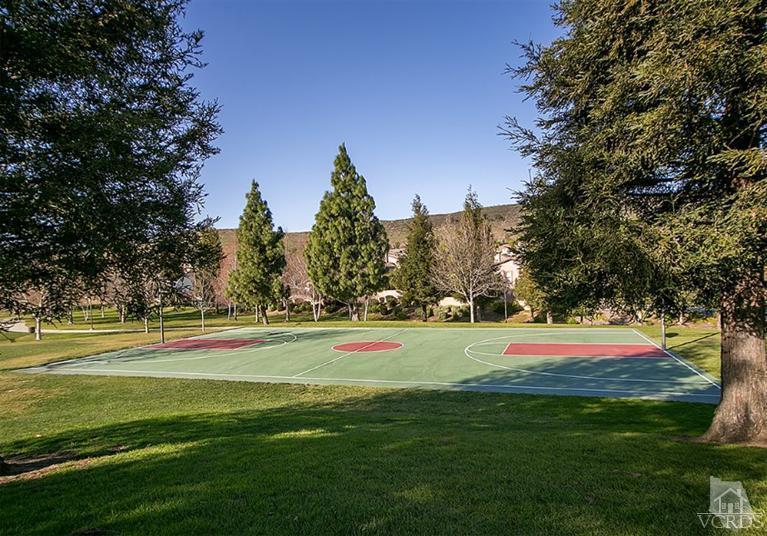 239 Knoll Ridge Road Simi Valley, CA 93065 - Photo 60 of 61 a yard with lots of trees and houses in the background