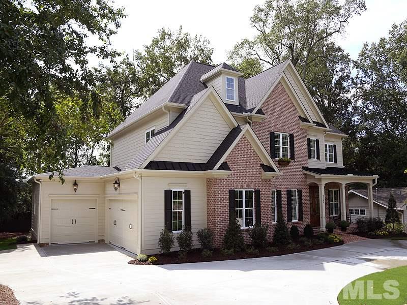 3204 Plantation Road Raleigh, NC 27609 - Photo 3 of 25 Great 3-car garage, parking pad and circular drive.