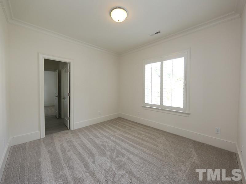 3204 Plantation Road Raleigh, NC 27609 - Photo 22 of 25 1 of 3 good sized bedrooms on 2nd floor. All have crown molding, carpet and great closets.