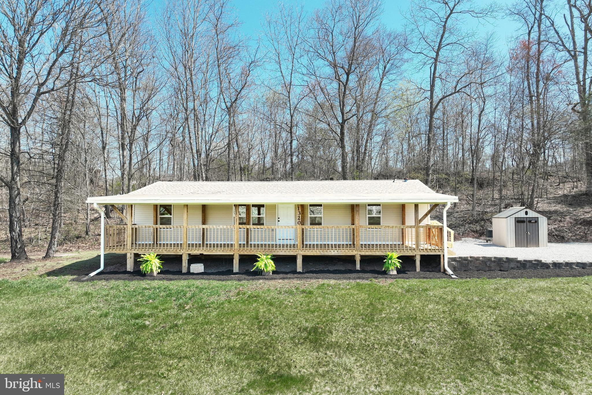 1320 Erney Road Dover, PA 17315 - Photo 3 of 35 a view of a house with a yard and sitting area