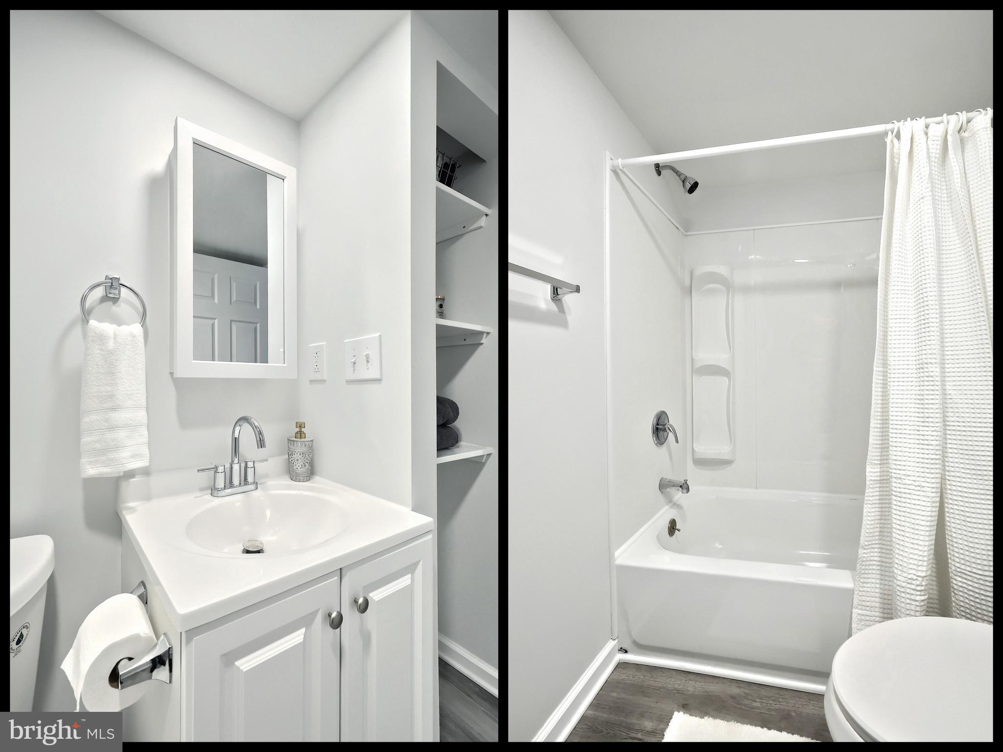 1320 Erney Road Dover, PA 17315 - Photo 35 of 35 a bathroom with a sink a mirror and a bathtub