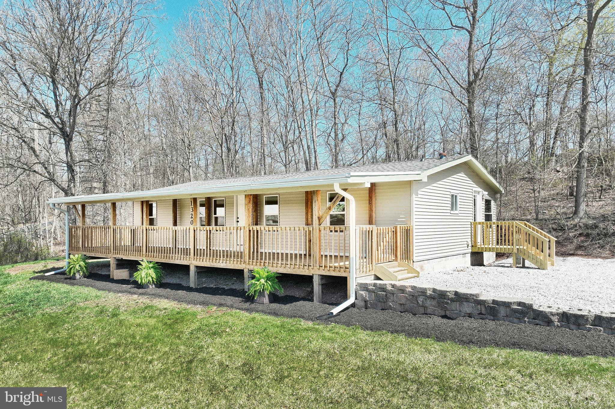 1320 Erney Road Dover, PA 17315 - Photo 4 of 35 a view of a house with a yard and sitting area