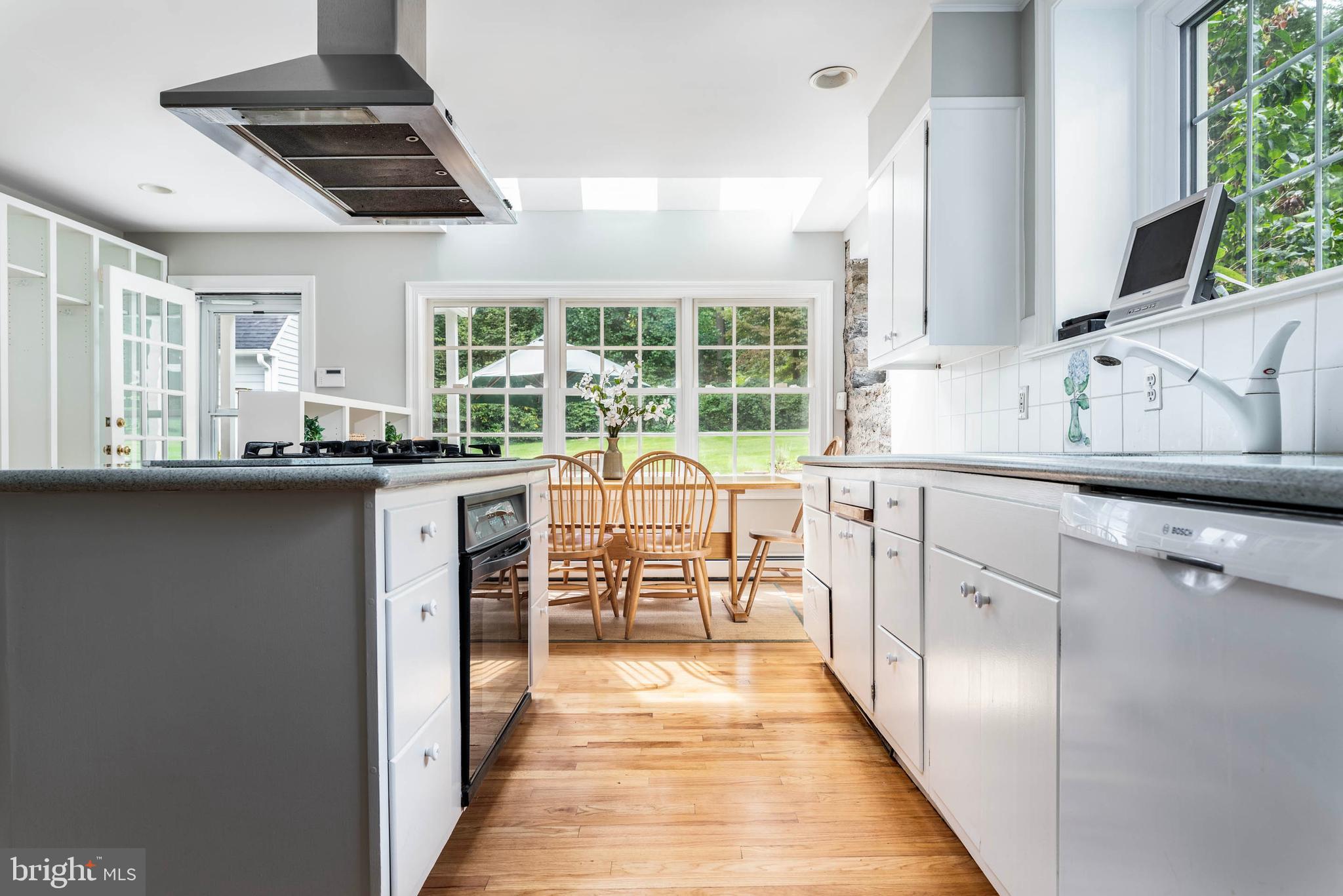 795 Harrison Road Villanova, PA 19085 - Photo 15 of 55 Sunny Kitchen with sight lines to patio