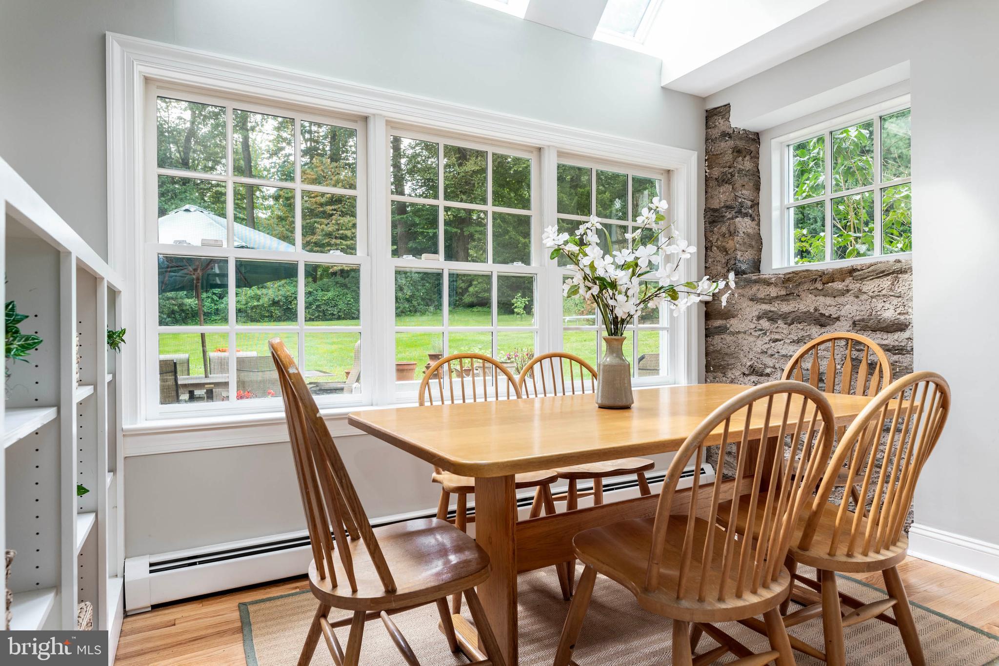 795 Harrison Road Villanova, PA 19085 - Photo 16 of 55 Kitchen Table w/ exposed stone wall
